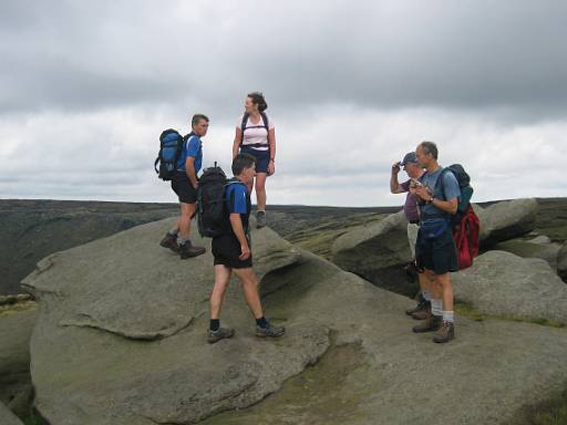 13_39-2.jpg - Walkers on the rocks.