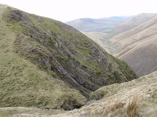 12_32-1.jpg - At the top of Black Force with Carlingill Beck heading off towards a snowy Lake District