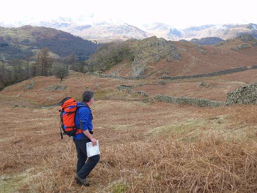 10_26-1.jpg - Dave descending from Loughrigg with views to snow topped Fells