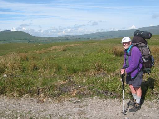 09_35-1.jpg - David on Cam High Road with Ingleborough behind