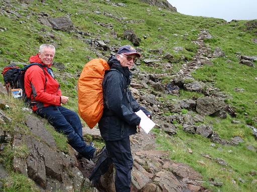 13_47-2.jpg - Rain gear on. Phil and Paul prepare to climb towards Lingmell.