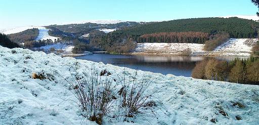 Reservoir2.jpg - Jan 5th 2003 : Windgather Rocks Snow improves even the reasonably easy walk around Erwood. I tried to get here 2 days before but the roads past Jenkin Chapel looked too icy to risk so I turned back. Today the roads were fine and the views are excellent.