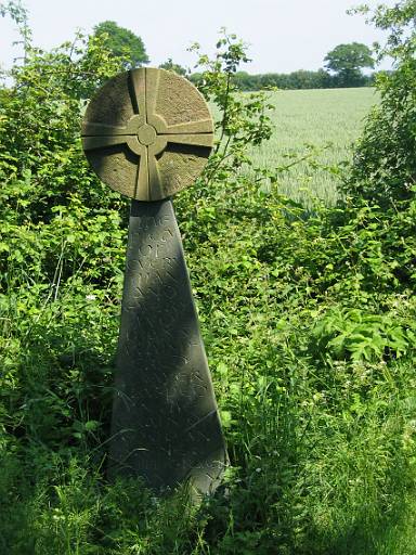 13_44-1.JPG - Sculptures on the trail. The piety of every man and womans whispered prayer clasped in the grain of wood and stone and in the grace of ancient ...